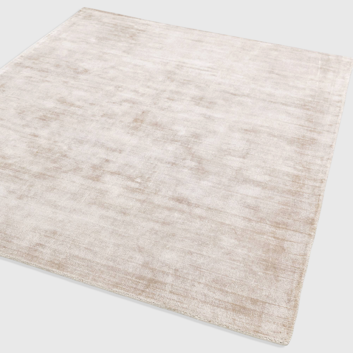 Alvo Rugs Blayde Putty hand-woven viscose rug in a neutral beige tone with a vintage tip-sheared finish.