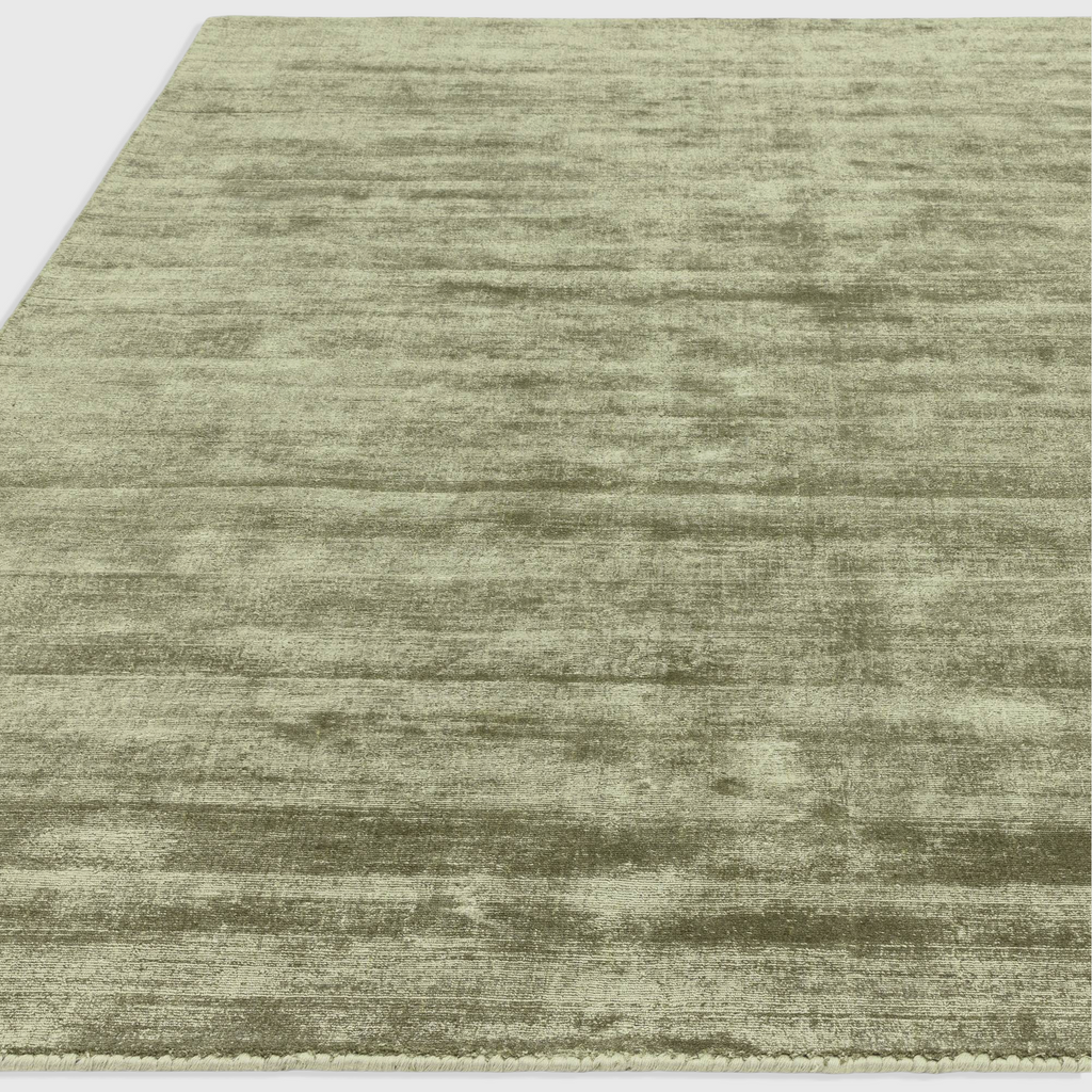 Alvo Rugs Blayde sage green hand-woven viscose rug with a vintage tip-sheared texture and soft loop pile finish.