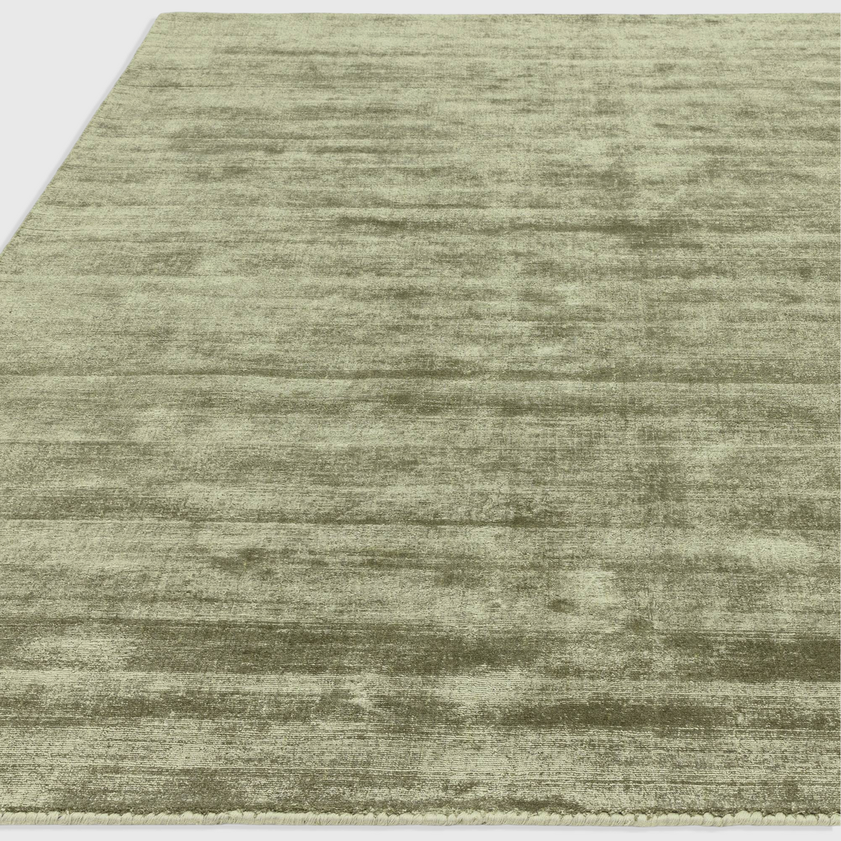 Alvo Rugs Blayde sage green hand-woven viscose rug with a vintage tip-sheared texture and soft loop pile finish.
