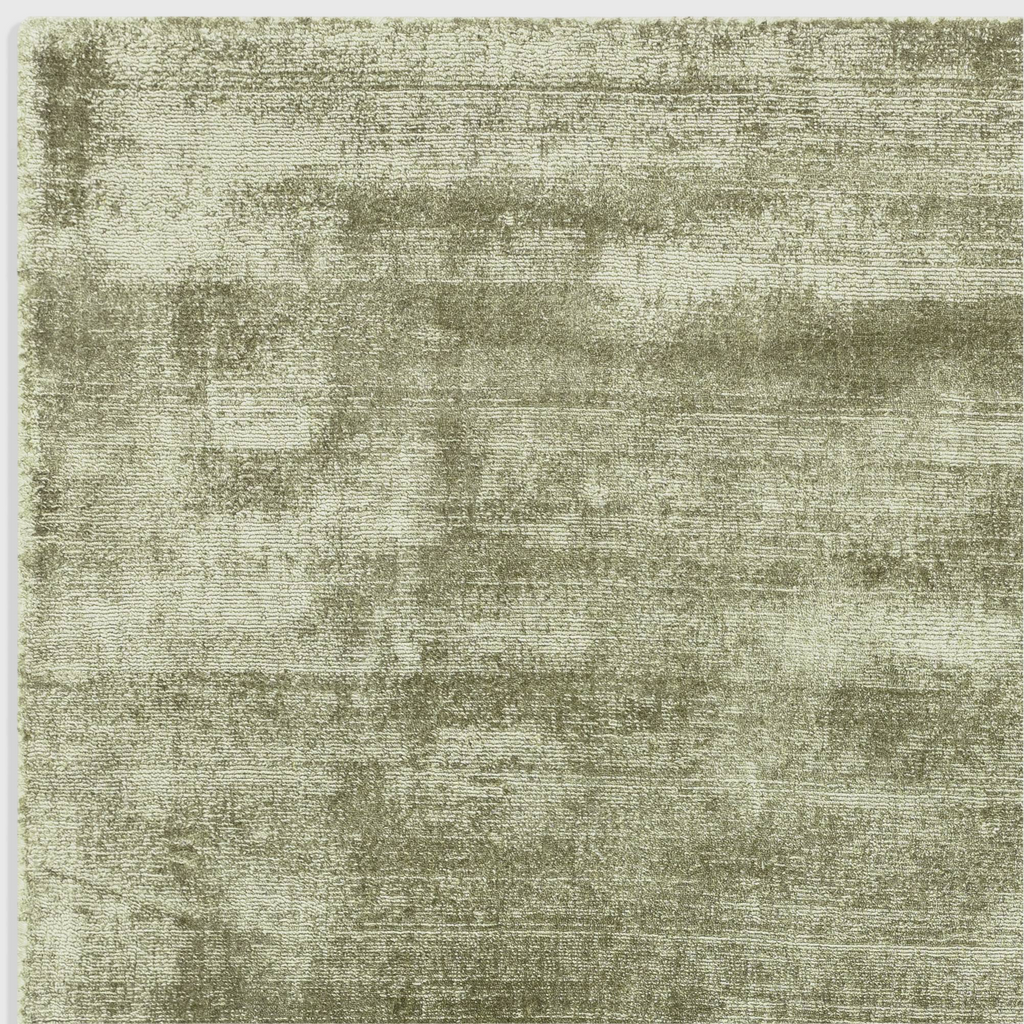 Alvo Rugs Blayde sage green hand-woven viscose rug with a vintage tip-sheared texture and soft loop pile finish.