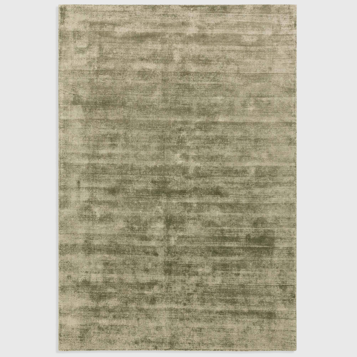 Alvo Rugs Blayde sage green hand-woven viscose rug with a vintage tip-sheared texture and plain contemporary design.