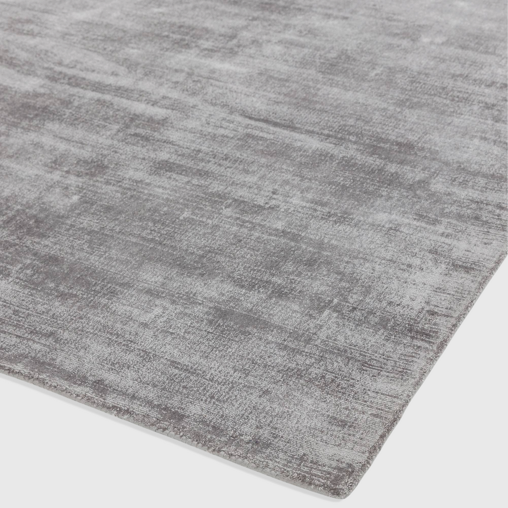 Alvo Rugs Blayde silver hand-woven viscose rug with a vintage tip-sheared finish and plain contemporary aesthetic.