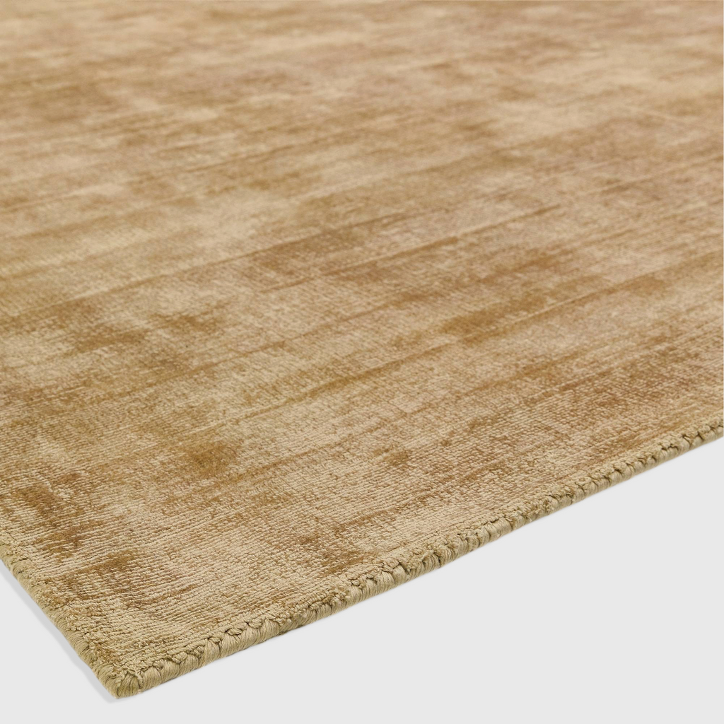 Alvo Rugs Blayde soft gold hand-woven viscose rug with a vintage tip-sheared texture and plain aesthetic.