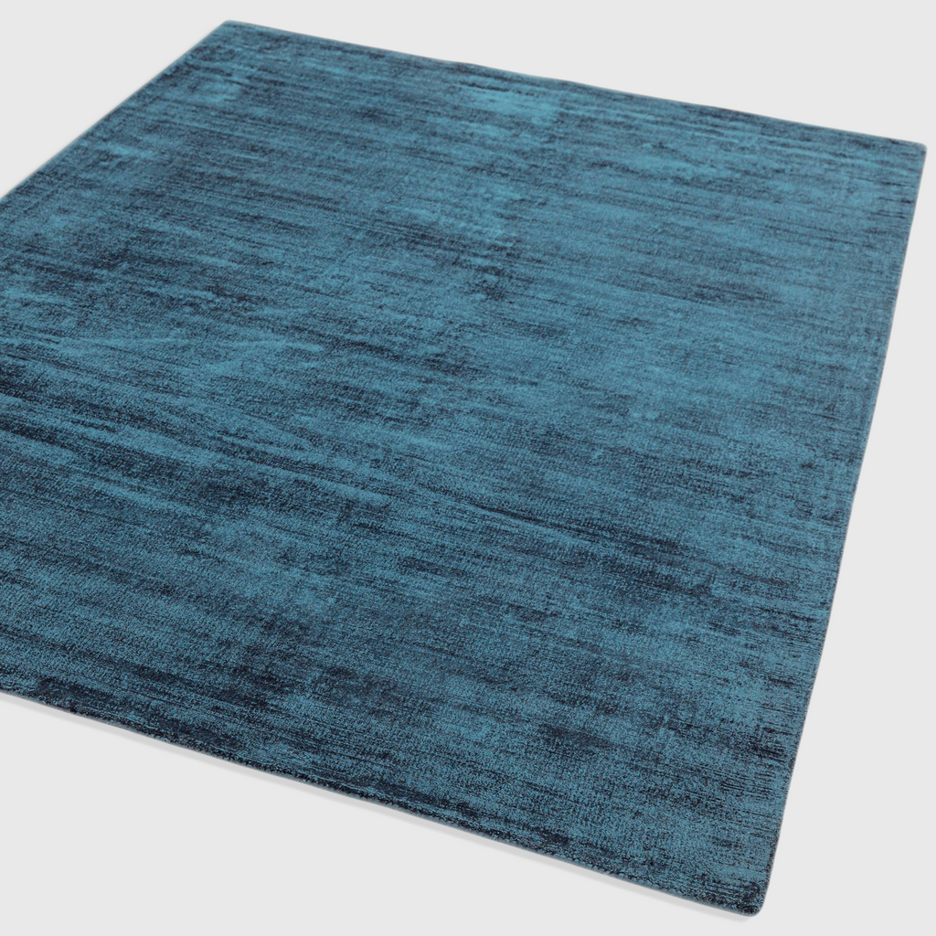 Alvo Rugs Blayde teal hand-woven viscose rug with a vintage tip-sheared finish and soft loop pile texture.