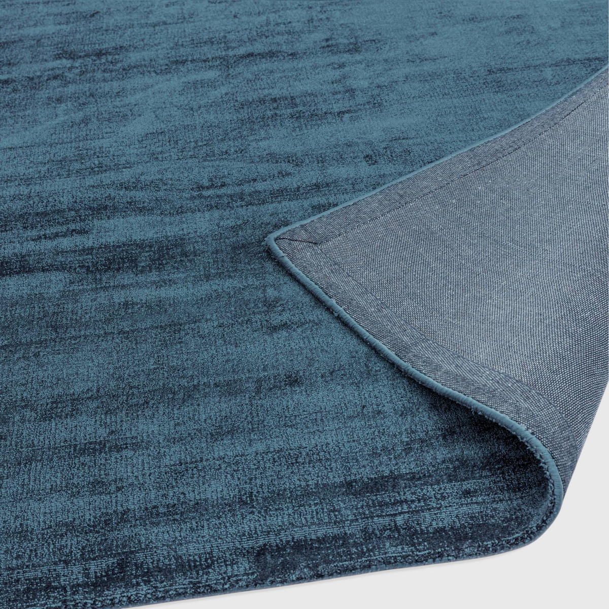 Alvo Rugs Blayde teal hand-woven viscose rug with a vintage tip-sheared finish and durable cotton polyester backing