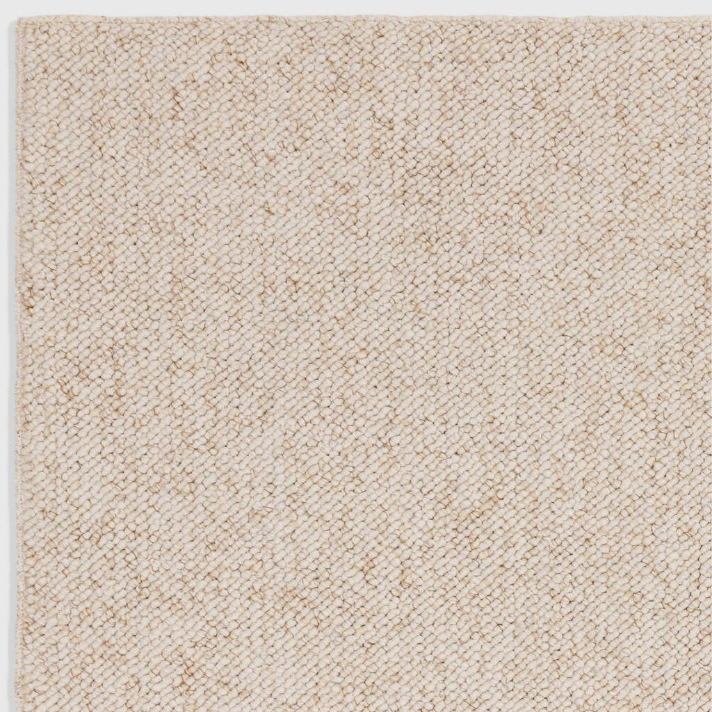 Alvo Rugs Bodenia ivory tufted bobble rug with a soft polyester texture and earthy neutral tones.