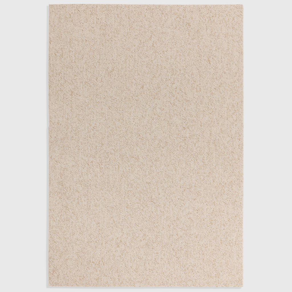 Alvo Rugs Bodenia ivory tufted rug with a plain aesthetic and soft polyester texture for a warm, boho interior style.