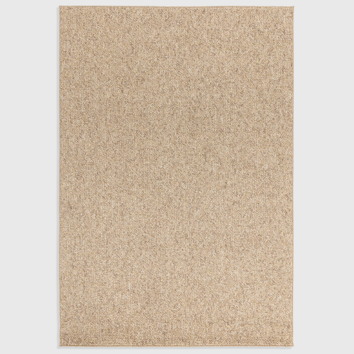 Alvo Rugs Bodenia sand coloured tufted polyester rug with a plain boho aesthetic and felt backing.