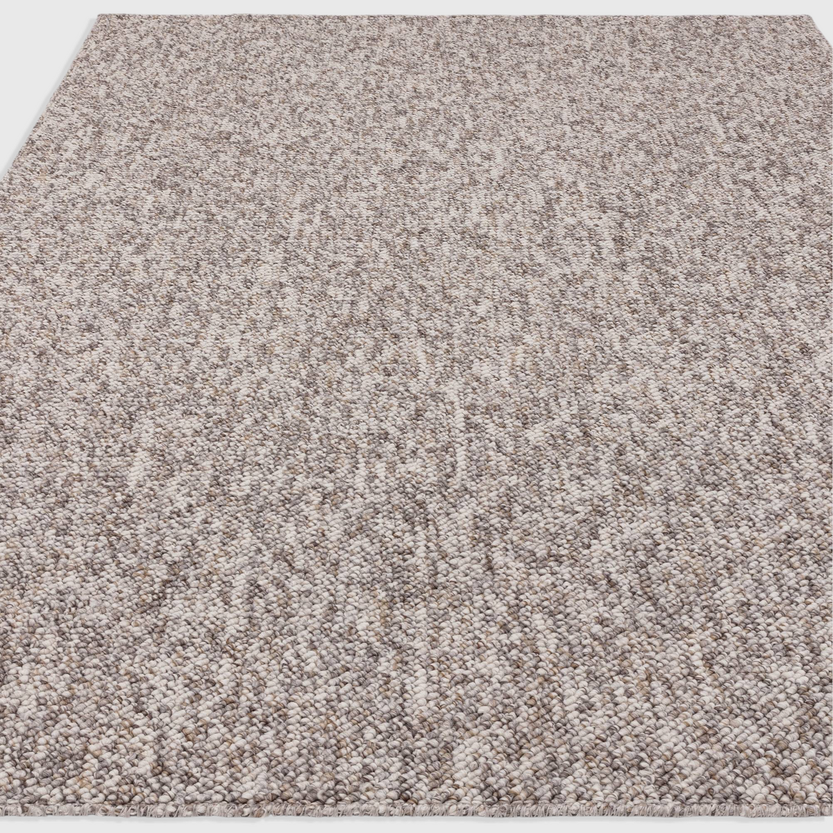 Alvo Rugs Bodenia stone grey tufted bobble rug with a soft polyester texture and earthy neutral tones.
