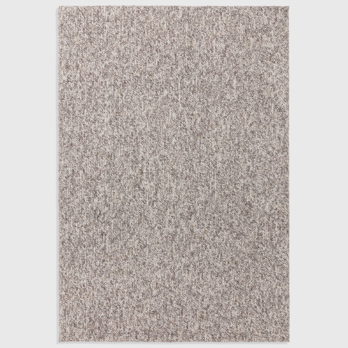 Alvo Rugs Bodenia Stone rug in grey with a textured tufted pile and a plain, minimalist aesthetic.