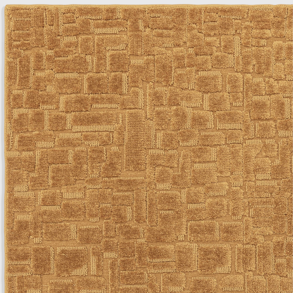Alvo Rugs Casabella Gold rug featuring a textured geometric cut and loop pile pattern in a warm yellow polyester.