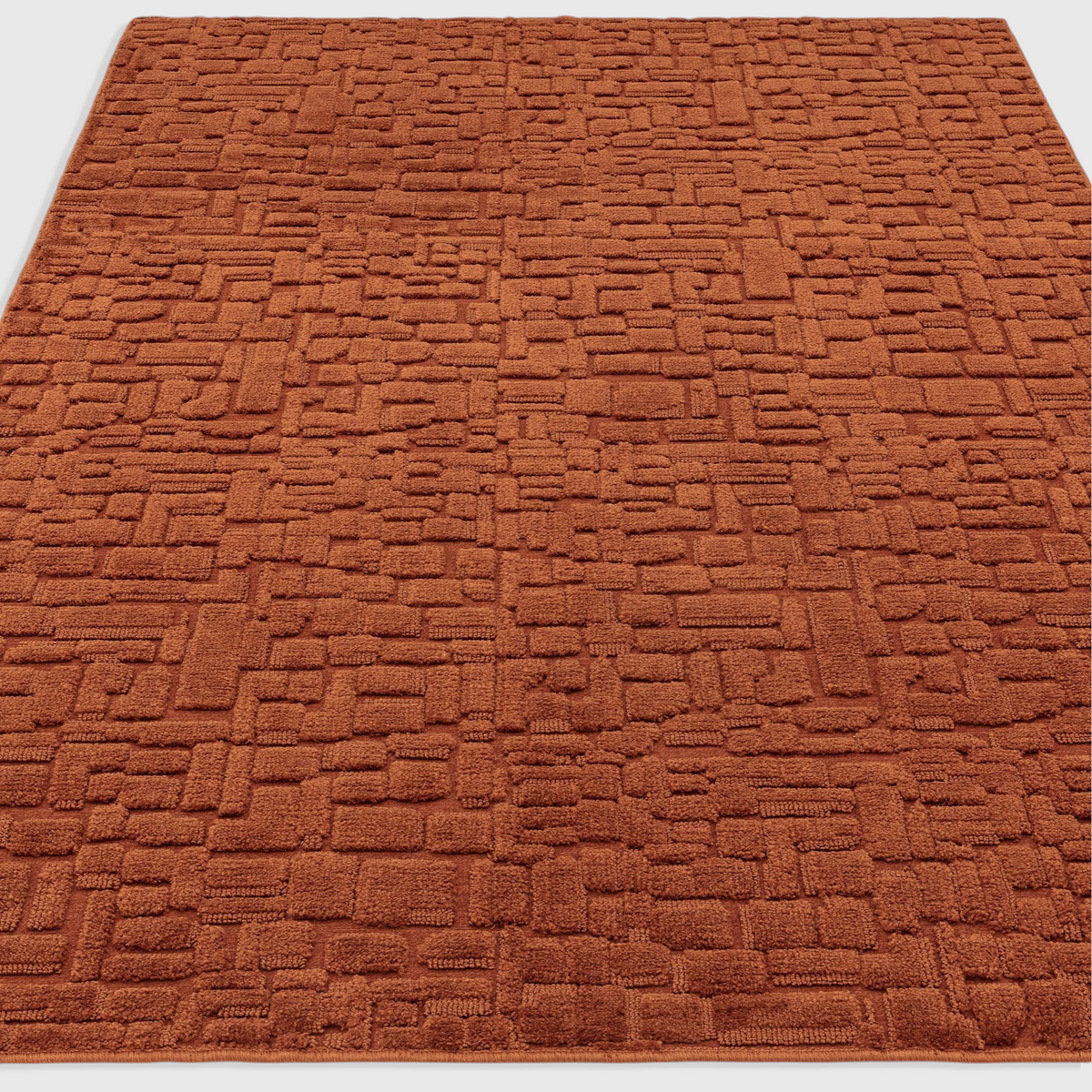 Alvo Rugs Casabella terracotta orange area rug with a textured cut and loop pile pattern in 100% polyester