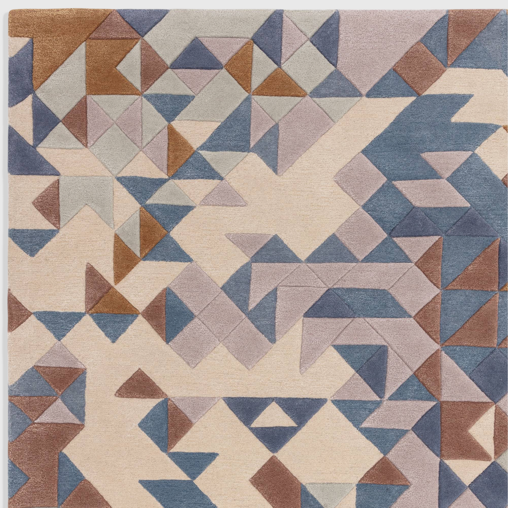 Alvo Rugs Elysian blue multi rug featuring a hand-tufted geometric pattern in wool and viscose with 3D carved details.