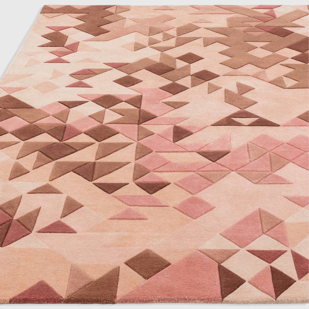 Alvo Rugs Elysian Rose multi-coloured hand-tufted wool and viscose rug with a 3D geometric triangle pattern.