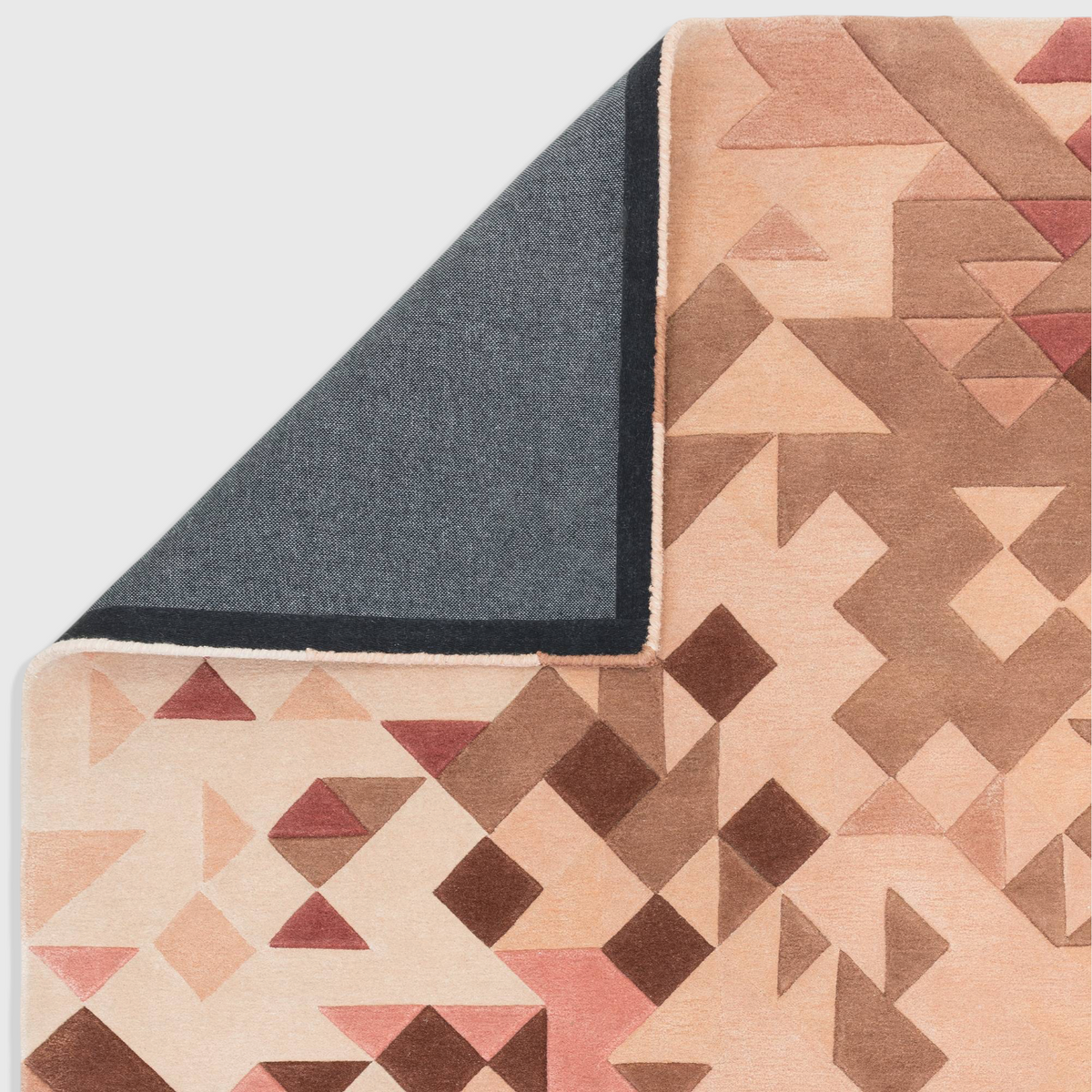 Alvo Rugs Elysian Rose multi-coloured hand-tufted wool and viscose rug with a geometric 3D carved pattern.