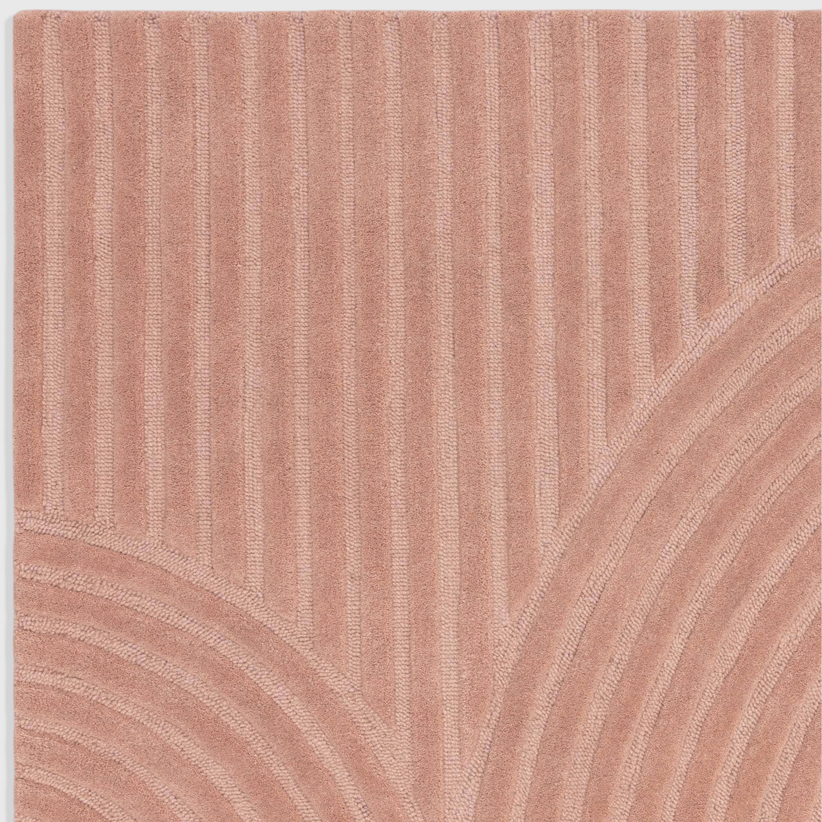 Alvo Rugs Hagia Blush rug featuring a soft pink wool texture with geometric cut and loop pile patterns.