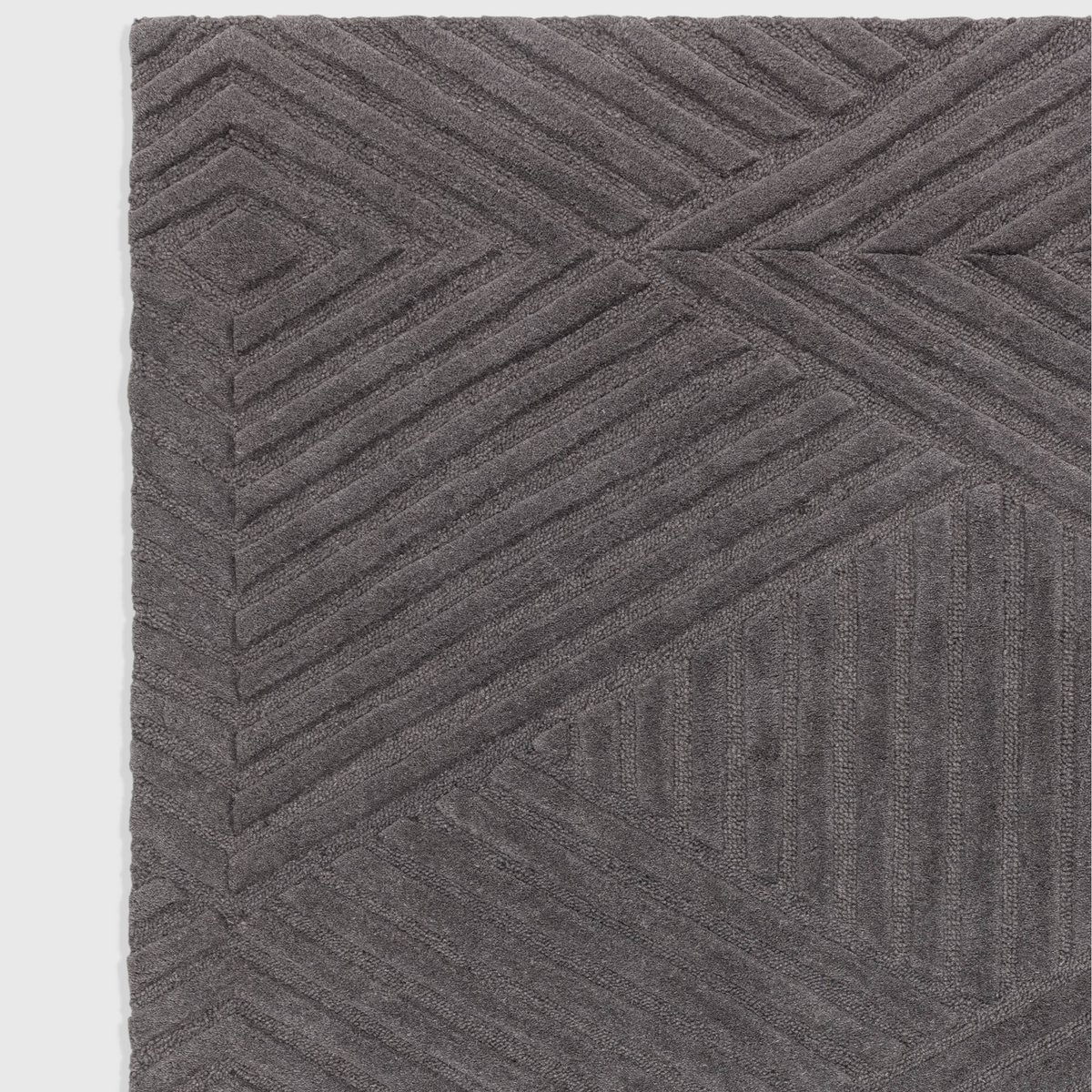 Alvo Rugs Hagia charcoal grey wool rug with hand-tufted geometric cut and loop pile texture