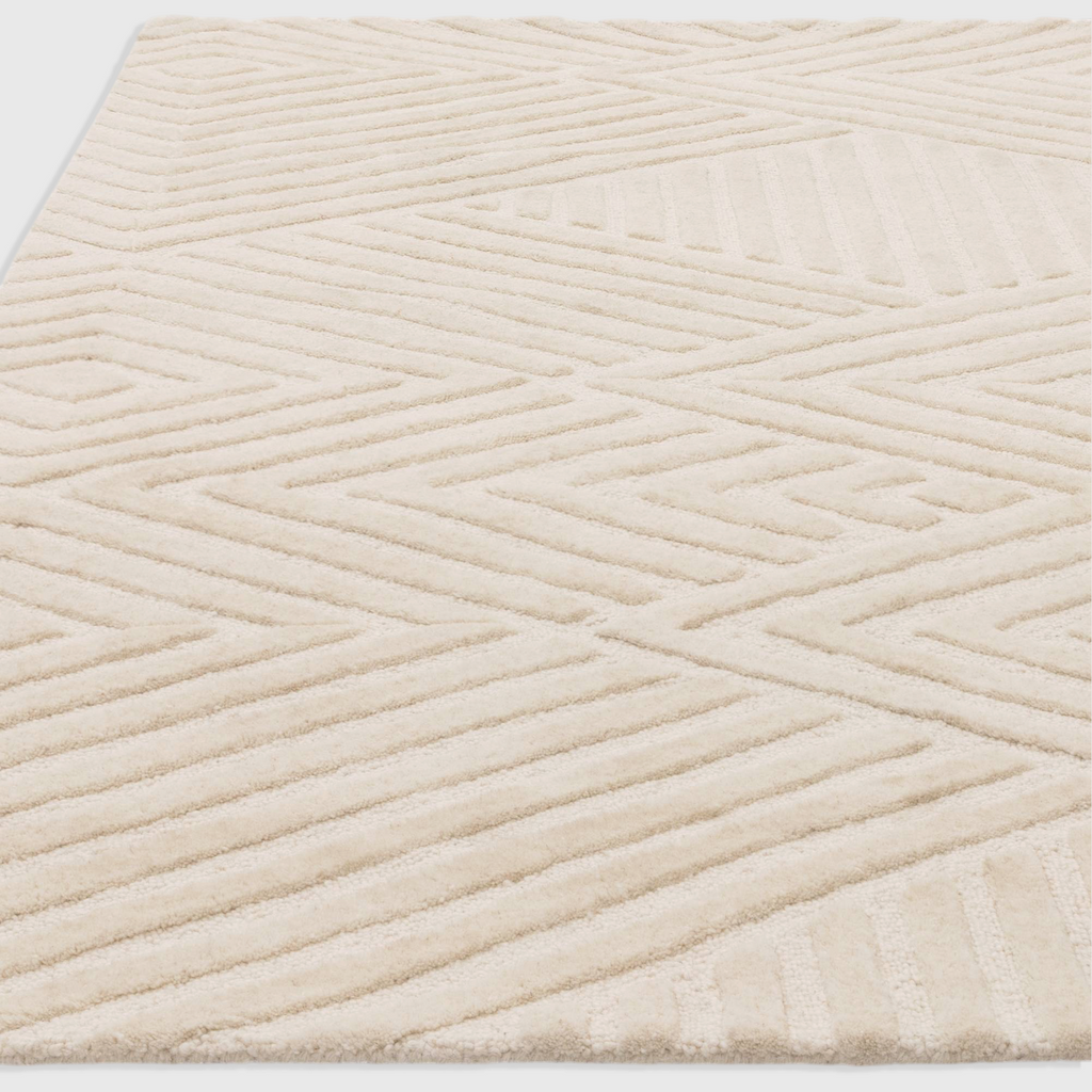 Alvo Rugs Hagia ivory wool rug with geometric cut and loop pile texture in a contemporary hand tufted design.
