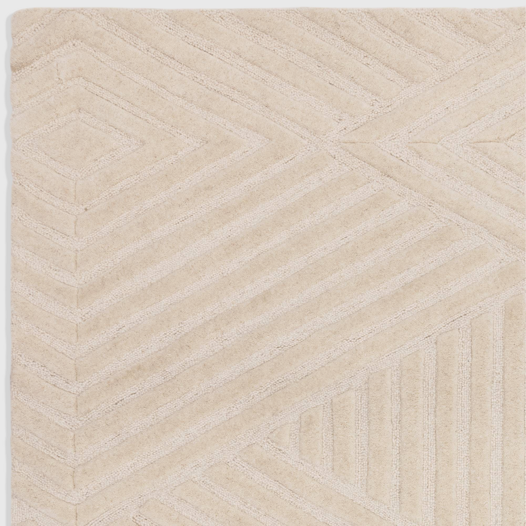 Alvo Rugs Hagia ivory wool rug with geometric cut and loop pile texture in a contemporary cream design