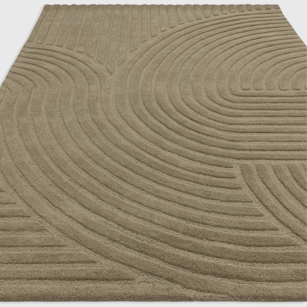 Alvo Rugs Hagia Sage wool rug featuring a geometric cut and loop pile design in soft green tones.