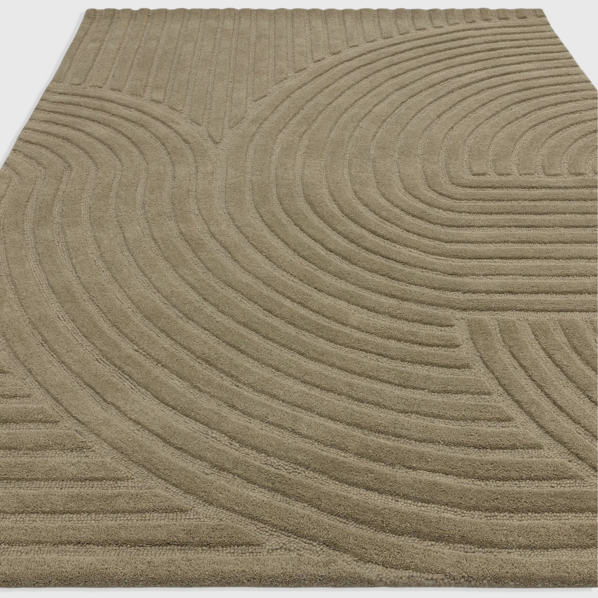 Alvo Rugs Hagia Sage wool rug featuring a geometric cut and loop pile design in soft green tones.