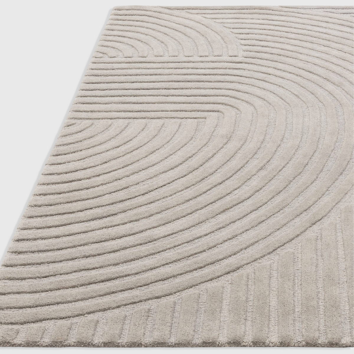 Alvo Rugs Hagia silver wool rug with geometric cut and loop pile curves in a modern contemporary style.