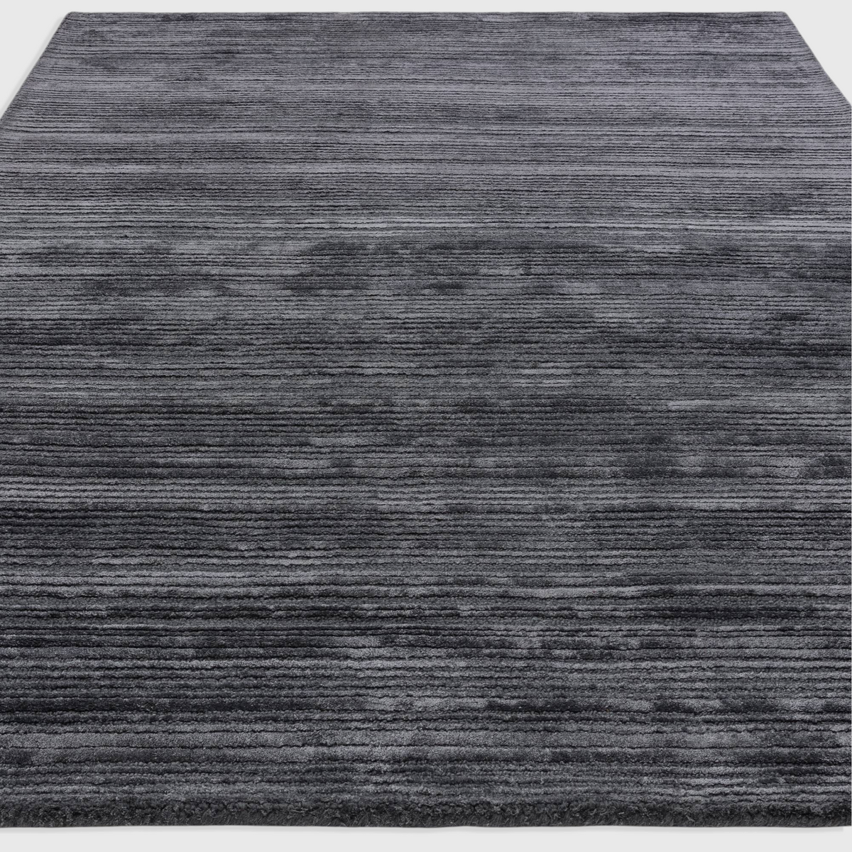 Alvo Rugs Henlee petrol blue hand-woven wool and viscose rug with textured cut and loop pile organic lines