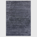 Alvo Rugs Henlee petrol blue hand-woven rug with a textured cut and loop wool and viscose pile.