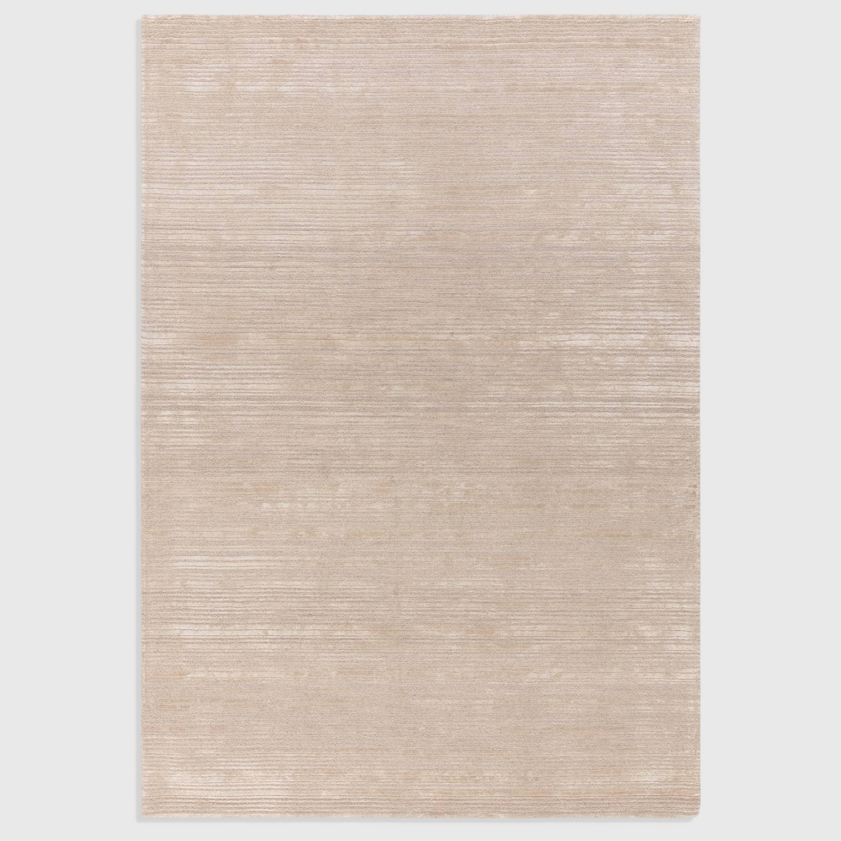 Alvo Rugs Henlee Putty rug with a hand-woven wool and viscose blend featuring a textured cut and loop pile design.