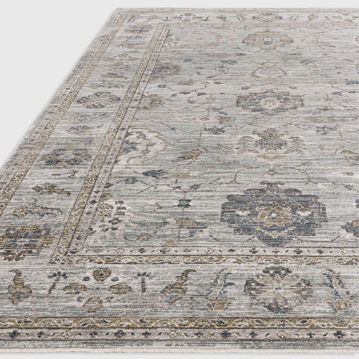 Alvo Rugs Jaspere Ja01 blue and neutral antique-style polyester area rug with a low pile and classic heritage pattern.