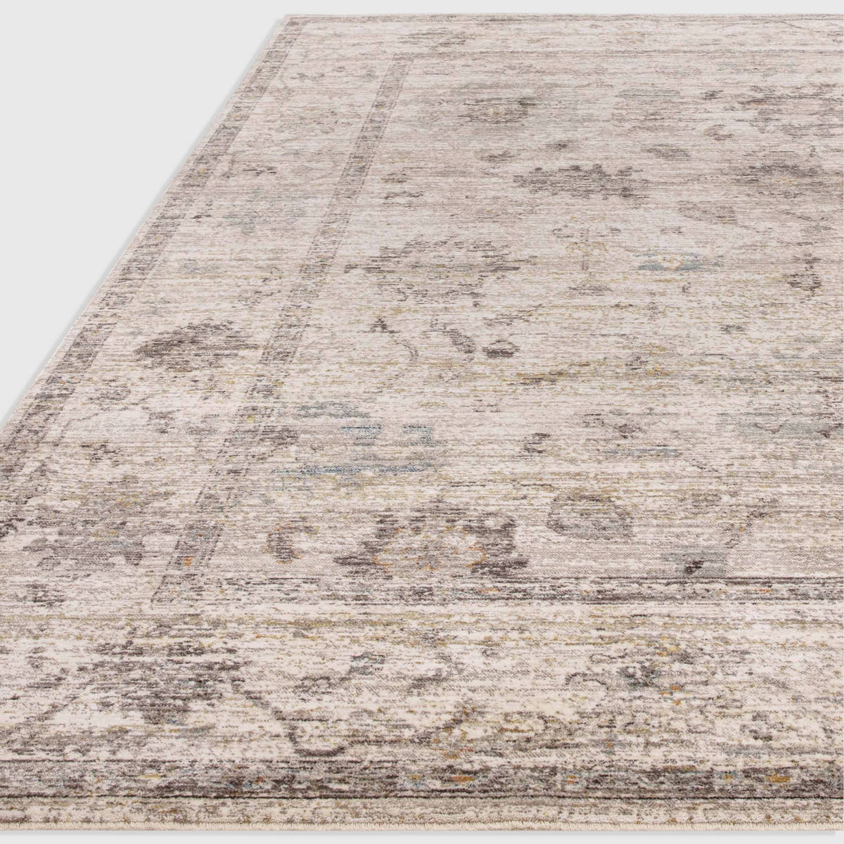Alvo Rugs Jaspere Ja02 beige and natural polyester area rug with a classic antique-inspired overdyed pattern.
