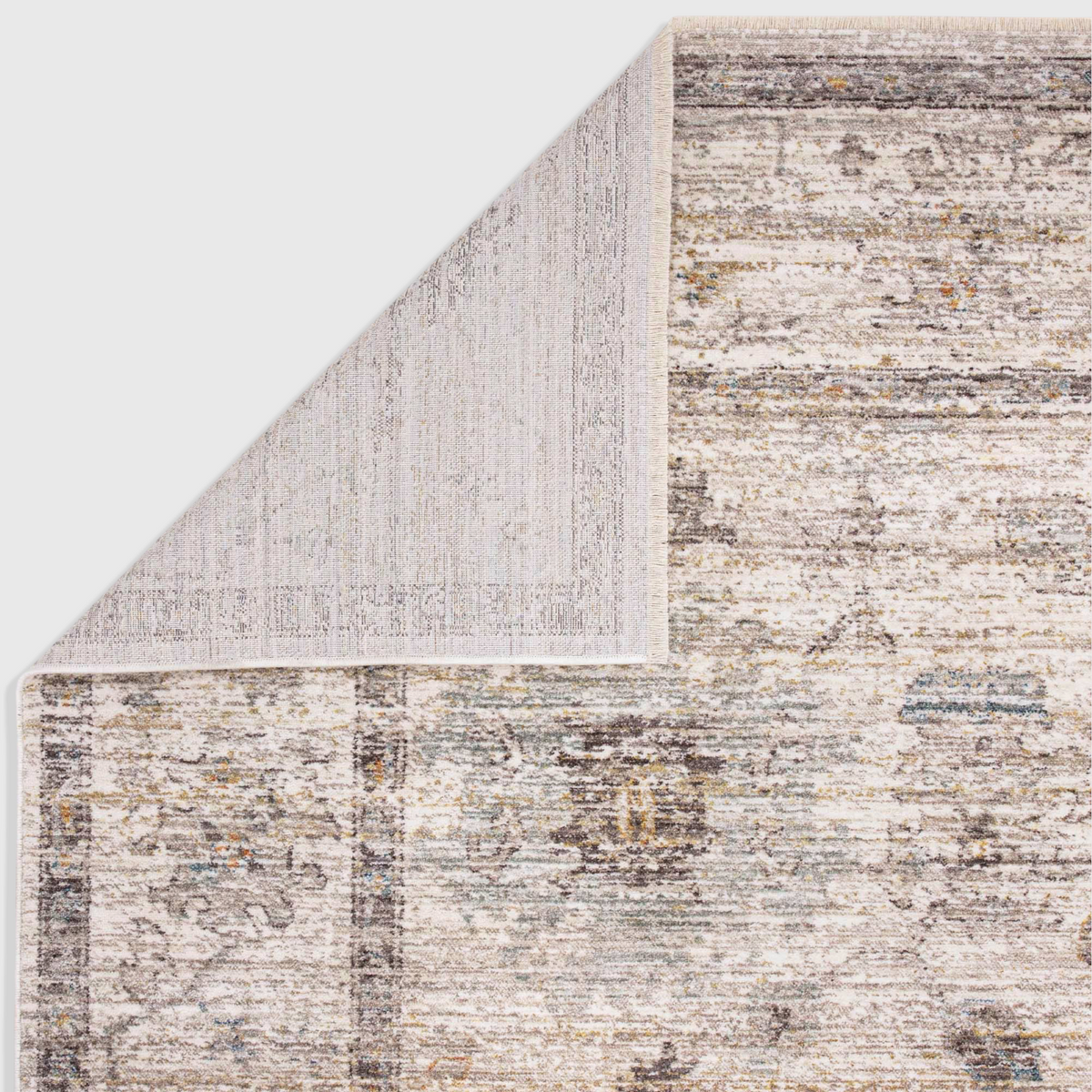 Alvo Rugs Jaspere Ja02 beige polyester rug with a classic antique-inspired pattern and visible cotton backing corner