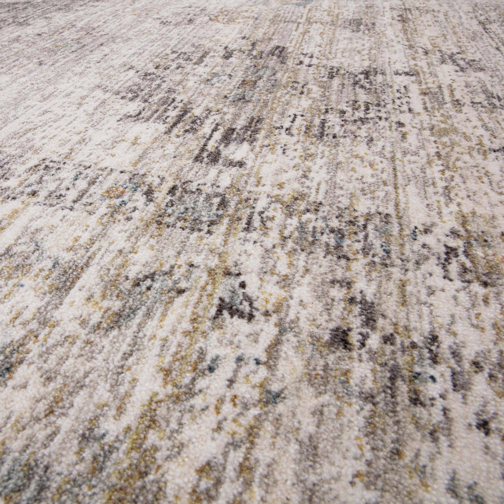 Alvo Rugs Jaspere Ja02 area rug in beige and natural tones with a distressed antique-inspired pattern and low pile.