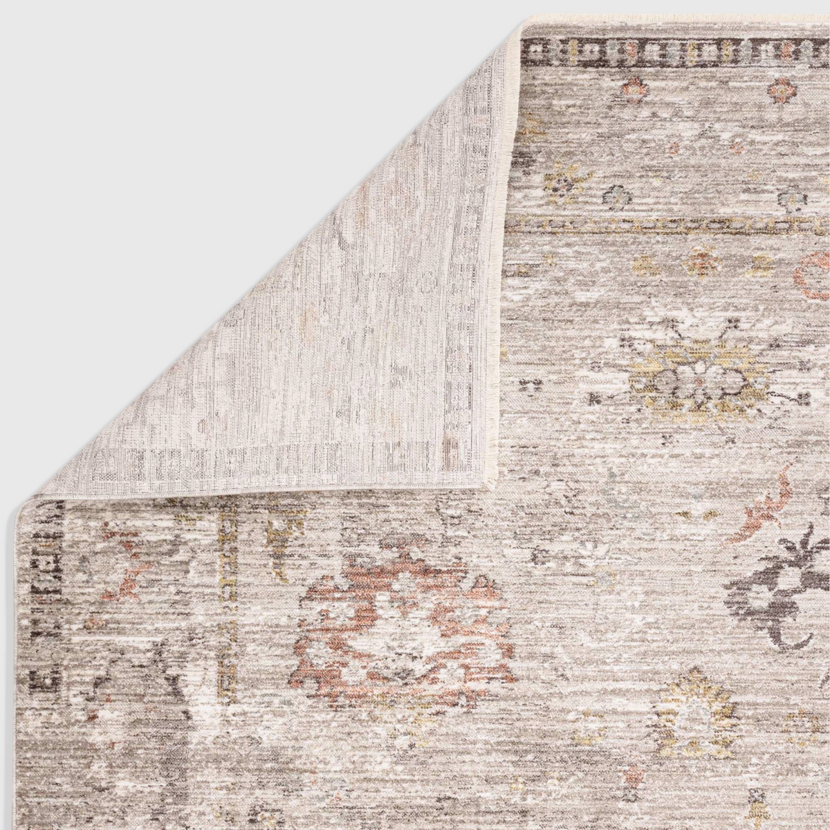 Alvo Rugs Jaspere Ja04 grey and silver polyester area rug with a classic antique-inspired pattern and folded corner