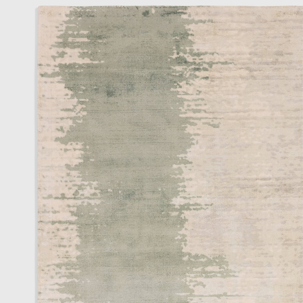 Alvo Rugs Junow Verdant hand-woven viscose rug featuring an abstract green and cream pattern with a soft loop pile.