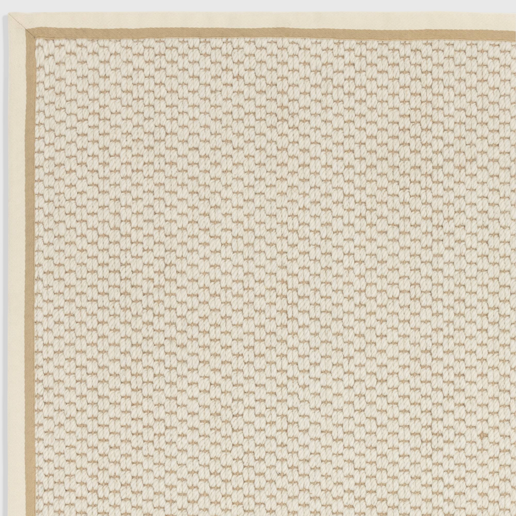 Alvo Rugs Kori cream linen rug featuring a textured double loop wool and jute flatweave with a clean cotton border.