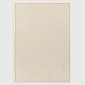 Alvo Rugs Kori cream linen flatweave rug with double loop texture and a contrasting beige cotton border.