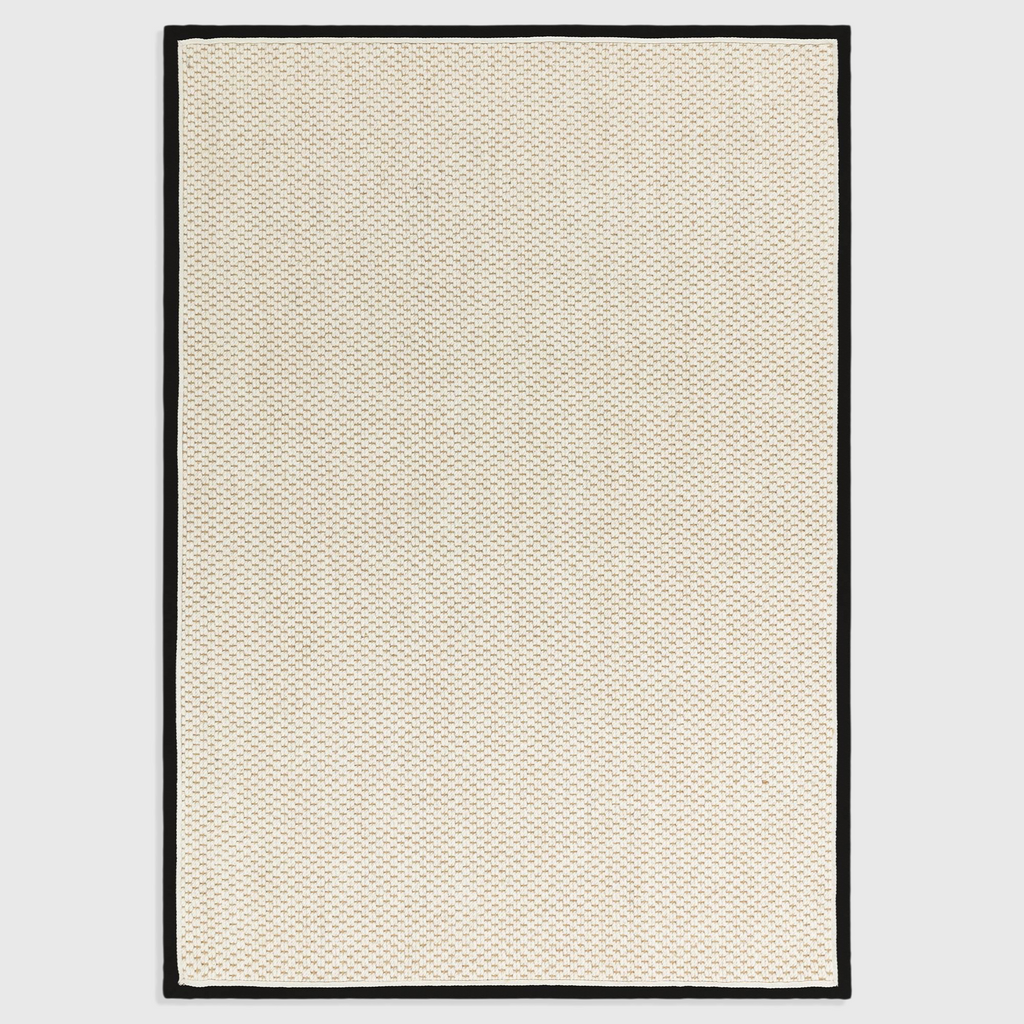 Alvo Rugs Kori charcoal and cream flatweave rug with a textured wool and jute loop design and a dark border.