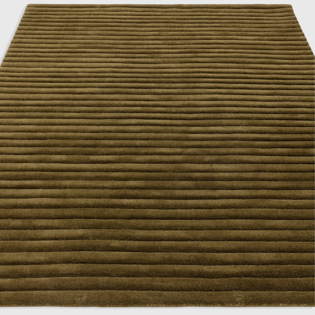 Alvo Rugs Lina Forest green wool rug featuring a textured high-low ridged pile design for a soft, modern aesthetic.