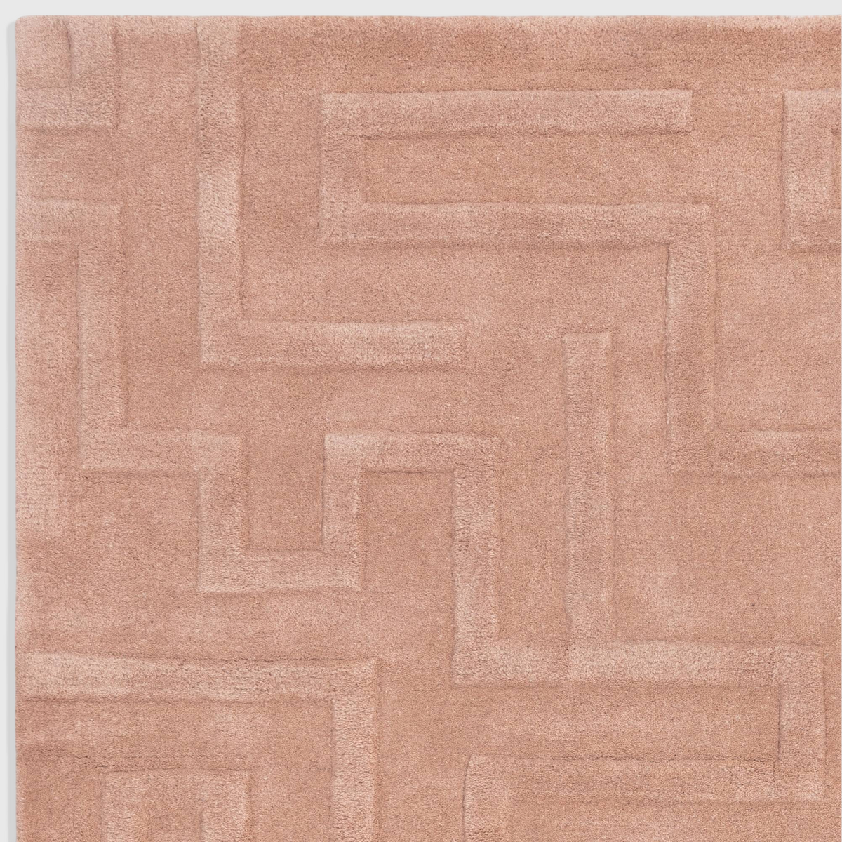 Alvo Rugs Maize Blush hand-tufted wool rug featuring a soft pink geometric high-low pile pattern