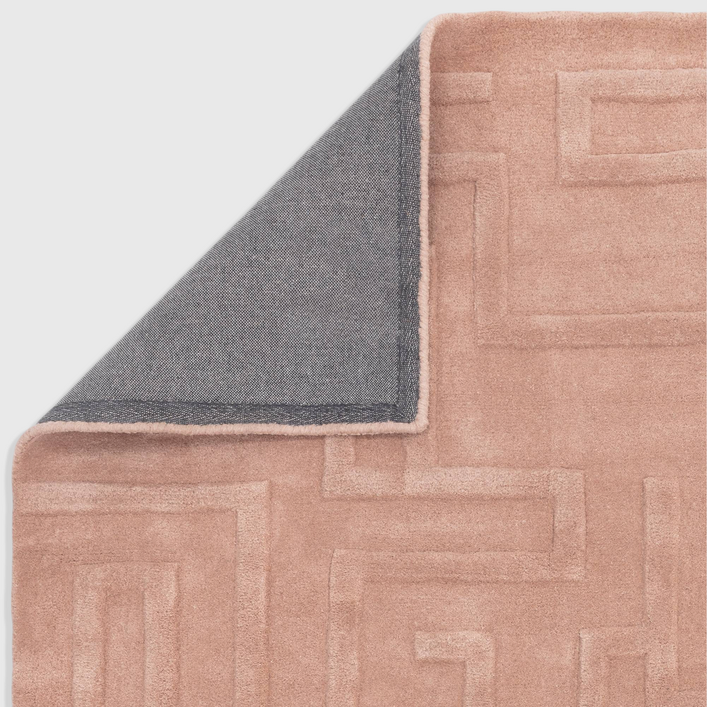 Alvo Rugs Maize Blush hand-tufted wool rug with a pink geometric high-low pile pattern and grey latex backing