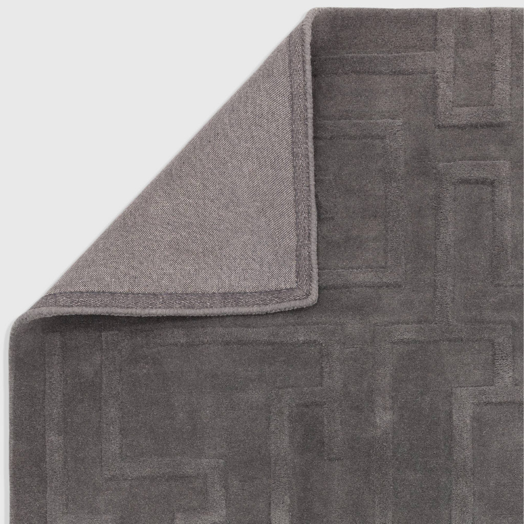 Alvo Rugs Maize charcoal grey wool rug with a high-low pile geometric maze pattern and durable latex backing.