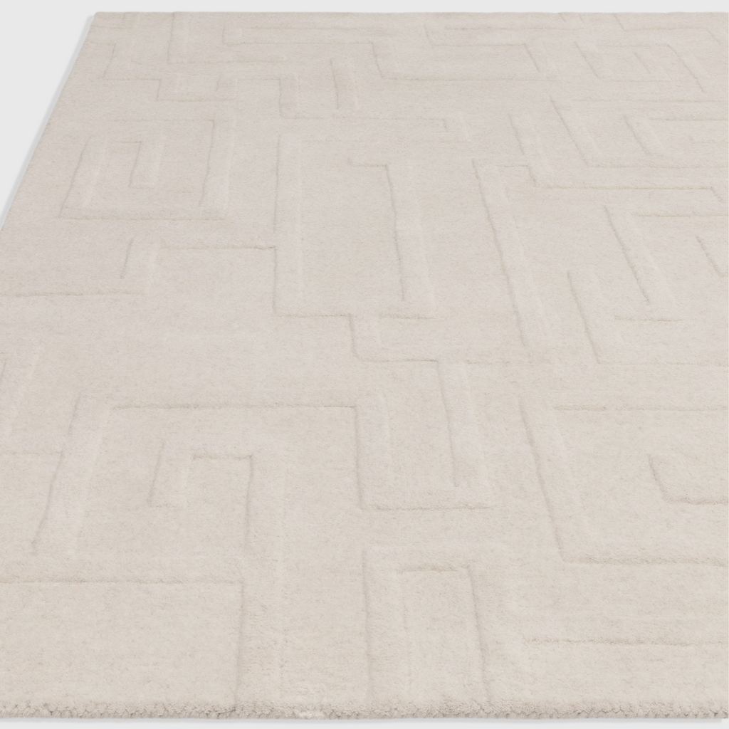 Alvo Rugs Maize cream hand-tufted wool rug featuring a subtle high-low pile geometric maze pattern.