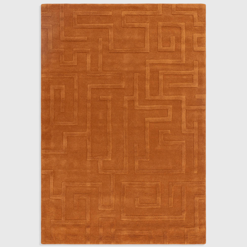 Alvo Rugs Maize Rust wool rug with a hand-tufted high-low pile geometric maze pattern in a warm orange tone.