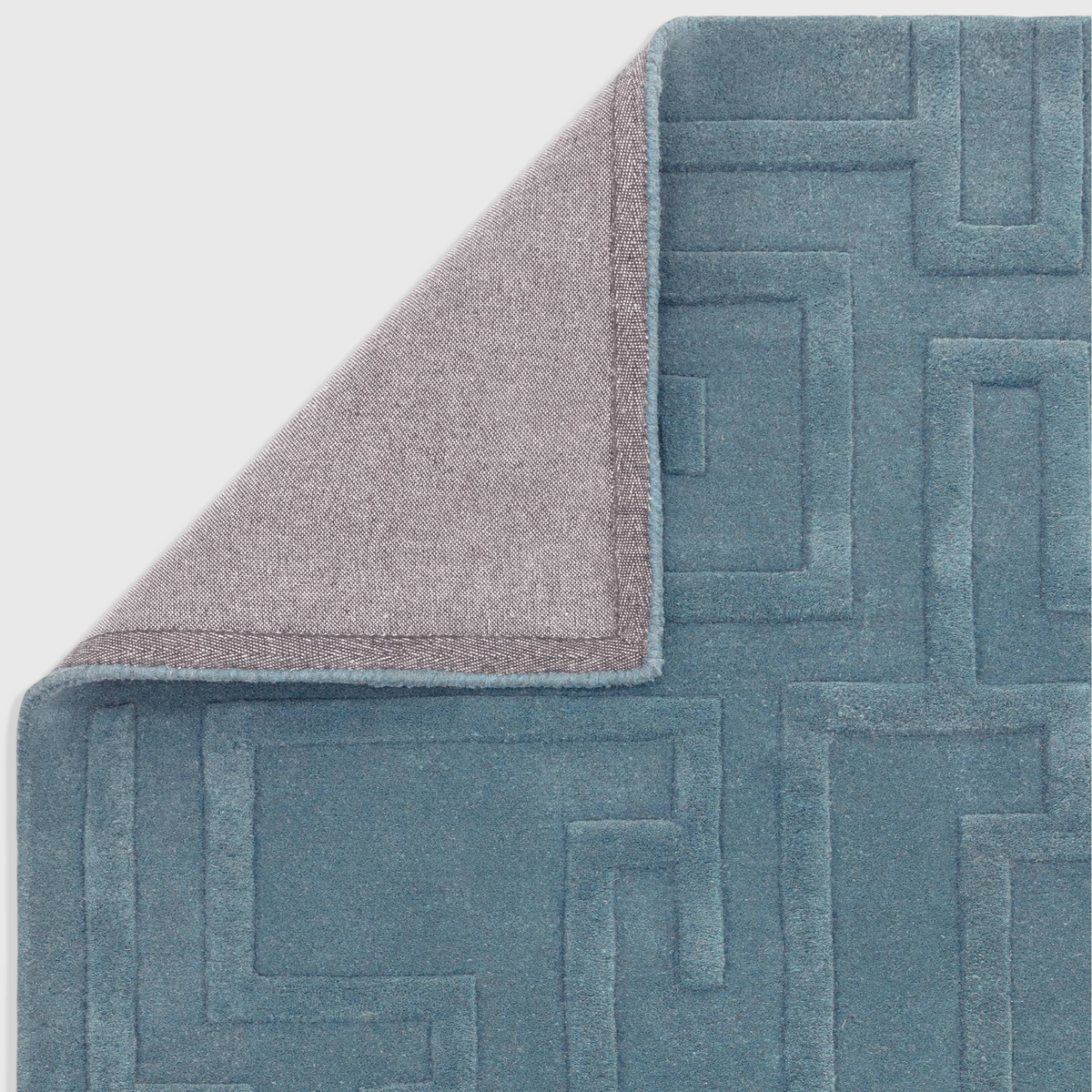 Alvo Rugs Maize Teal rug featuring a hand-tufted wool construction with a geometric high-low pile pattern