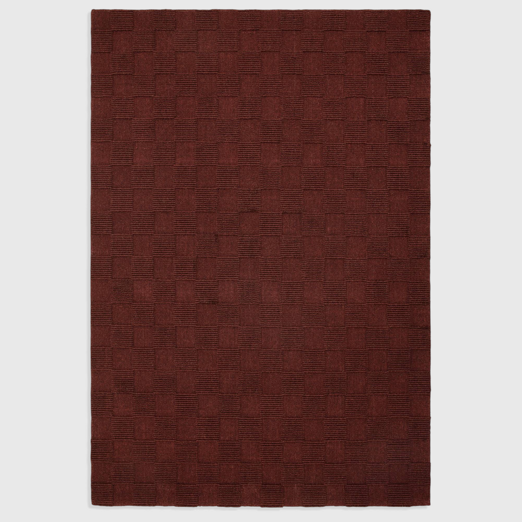 Alvo Rugs Mercia burgundy hand-woven wool rug with a textured loop pile checkerboard pattern