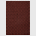 Alvo Rugs Mercia burgundy hand-woven wool rug with a textured loop pile checkerboard pattern