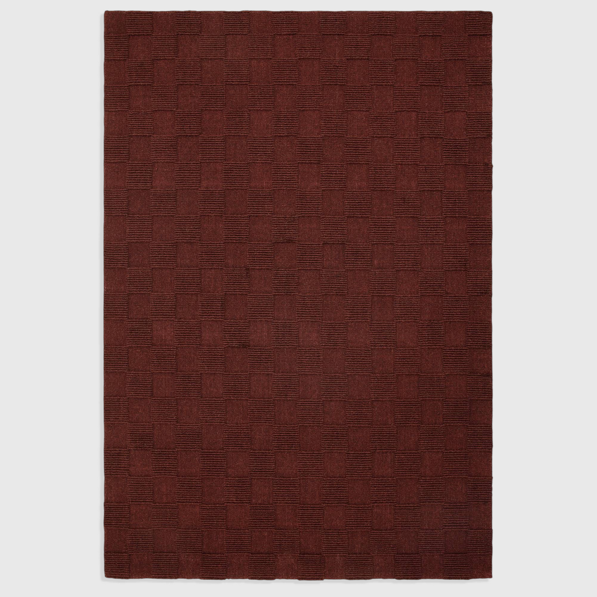 Alvo Rugs Mercia burgundy hand-woven wool rug with a textured loop pile checkerboard pattern
