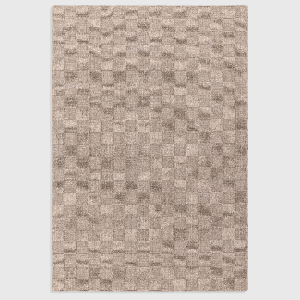 Alvo Rugs Mercia natural wool rug with a hand-woven loop pile and a subtle checkered texture in neutral beige tones.