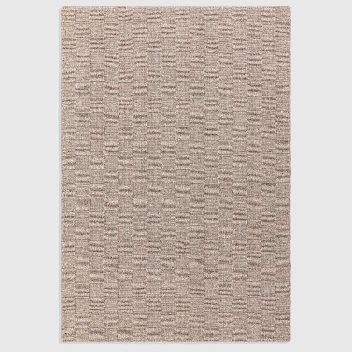 Alvo Rugs Mercia natural wool rug with a hand-woven loop pile and a subtle checkered texture in neutral beige tones.